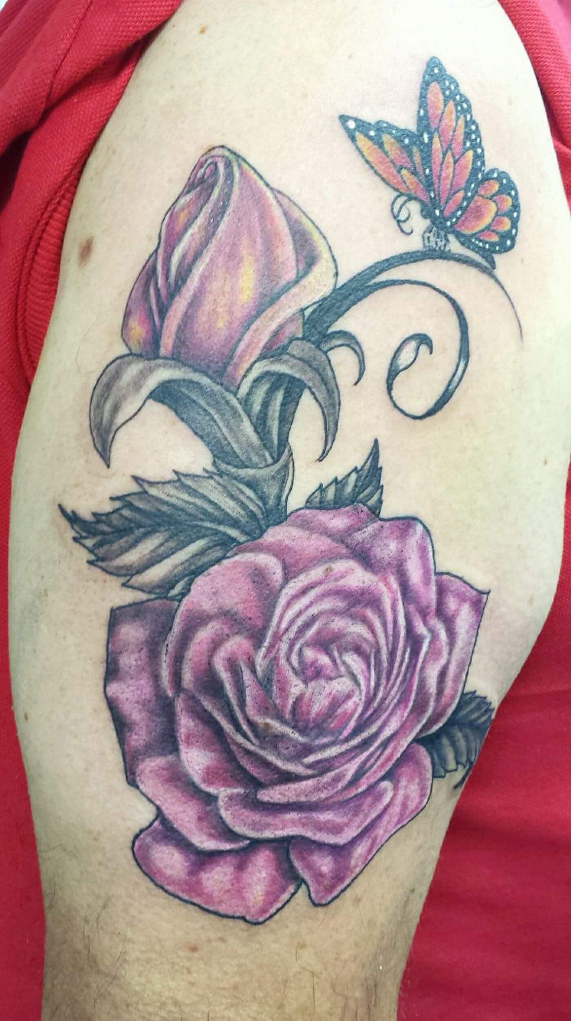 Colour rose and butterfly tattoo, shoulder piece